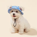 Small dog wearing the Floppy bucket hat in the Blue Tie-Dye print